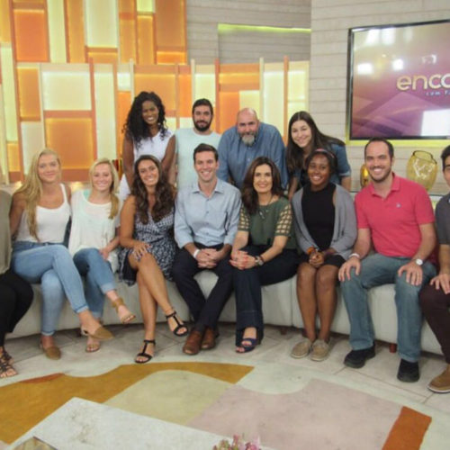 Ashley Osiecki, Kelsey McCormick, and Alex Bruder of Queens University of Charlotte (from left). Fatima is in the green blouse in front. In the red shirt is Daniel Amgarten of Campus Brasil. In the gray shirt at far right is Mackenzie Presbyterian University student Luis Ottoni, field producer and translator for Queens in Rio.