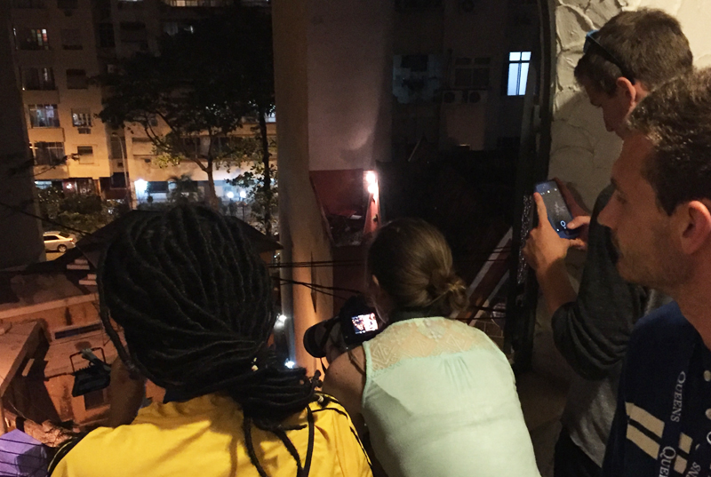 American university students watching for signs of a protest in the Copacabana neighborhood, Pura Vida Hostel, Aug. 9, 2016