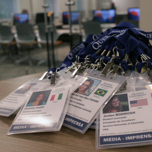 Student journalist badges for Queens in Rio students.