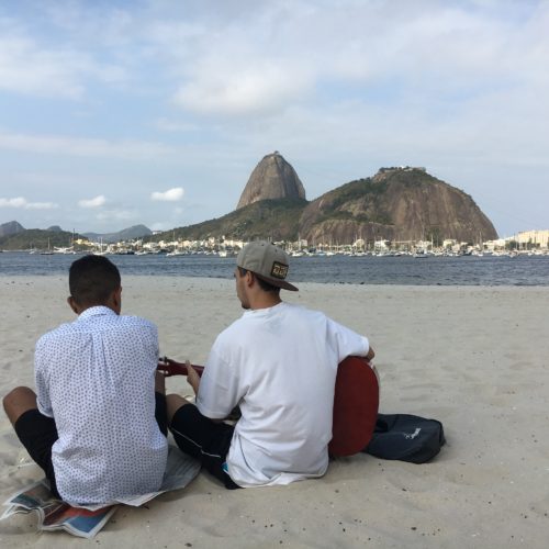 Two residents of rio playing music on the Botafogo beach